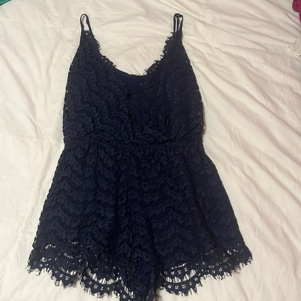 Lauren and Claire navy romper size small. Great condition barely worn.